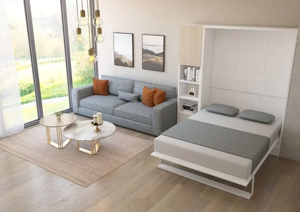 hotelboxsprings Moderne woonkamer met opklapbed en grijze bank naast grote ramen.